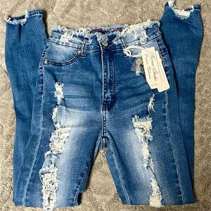 New with tags Roma Studio Distressed Blue Jeans